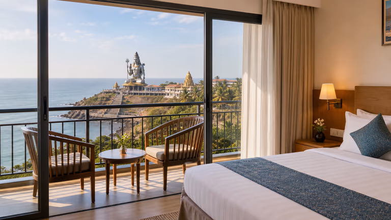 Murudeshwar stay view with sea and temple silhouette, ideal for resort and room selection