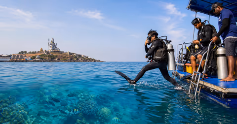 Murudeshwar scuba diving at Netrani Island with blue sea and boat