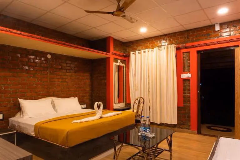 AC Deluxe Room Interior with exposed brick walls
